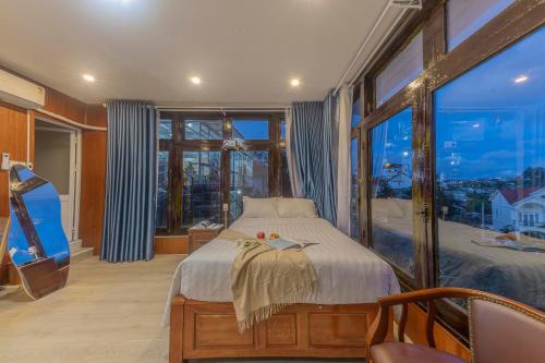 Katil atau katil-katil dalam bilik di Mộc Yên Home Dalat