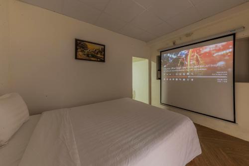 Katil atau katil-katil dalam bilik di Mộc Yên Home Dalat