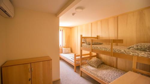 Postel nebo postele na pokoji v ubytování Green House Hostel