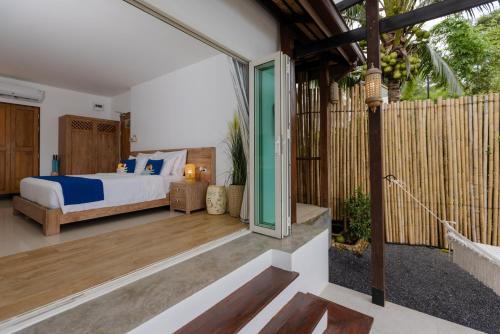 Katil atau katil-katil dalam bilik di Purana Resort Koh Yao Noi - SHA Extra plus