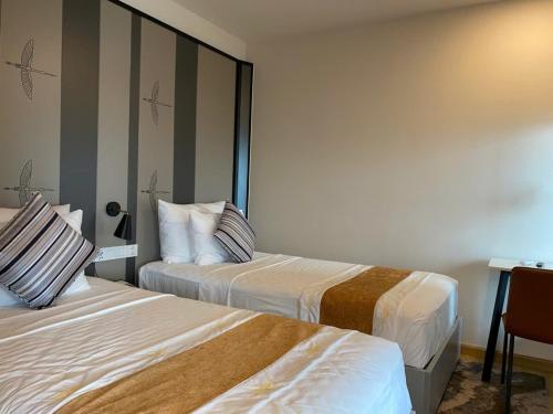 Postel nebo postele na pokoji v ubytování Căn hộ 1 phòng ngủ Wyndham Lynn Times Thanh Thủy