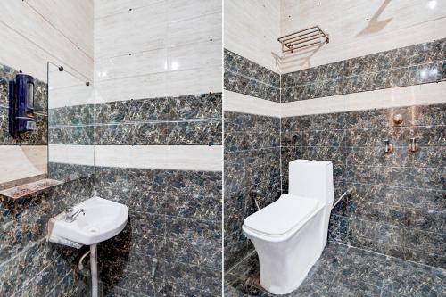 IndirapuramにあるHotel O Sector 121 Gaur City Mall Noida Formerly Royal FNGのトイレと洗面台付きのバスルーム