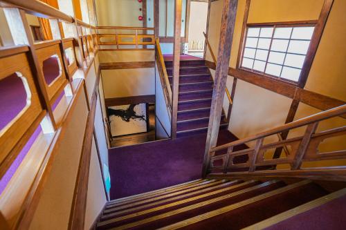 an overhead view of a staircase in a building at Ochiairo in Izu