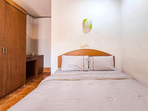 Katil atau katil-katil dalam bilik di Budget Hotel Koh Lanta