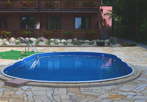 Bazén v ubytování Apartament Poddąbie nebo v jeho okolí