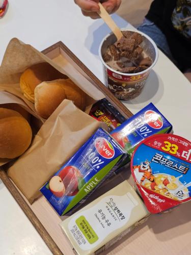a tray of food on a table with food at Kids Hotel Sangsang Play in Ulsan