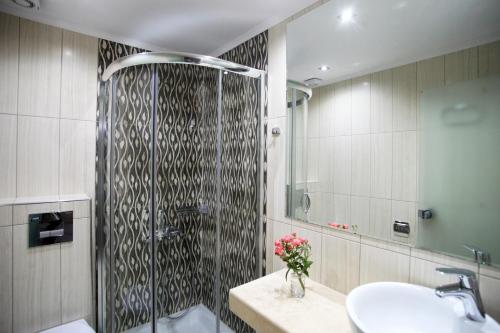 Koupelna v ubytování Kochili Seashell Apartments