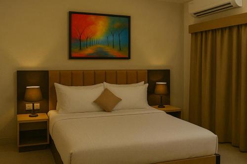 Cama o camas de una habitación en Perfectstayz Premium Kaashin near Kashi Ghat