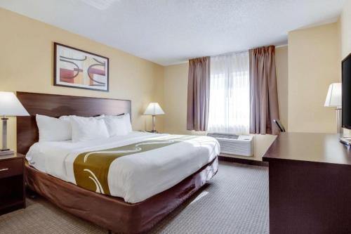 Ένα ή περισσότερα κρεβάτια σε δωμάτιο στο Quality Inn & Suites Lincoln North