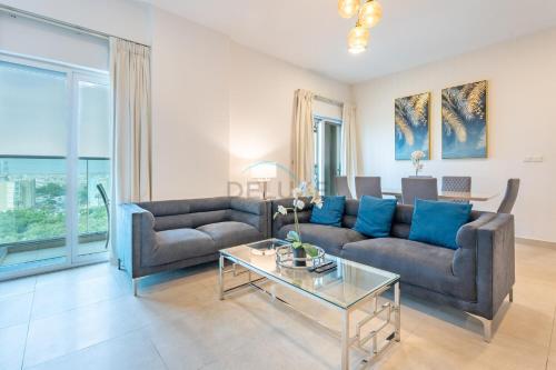 Balcony Overlooking the Community, Quick Metro Access,Short 15-Minute Drive to Ibn Battuta Mall, Viktoria Residency, Al Furjan by Deluxe Holiday Homes