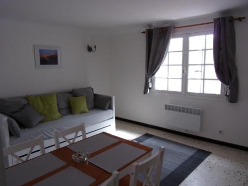 Posezení v ubytování Appartement L'oranger