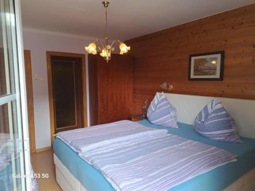 Postel nebo postele na pokoji v ubytování Apartment in Feld am See near Ski Slopes