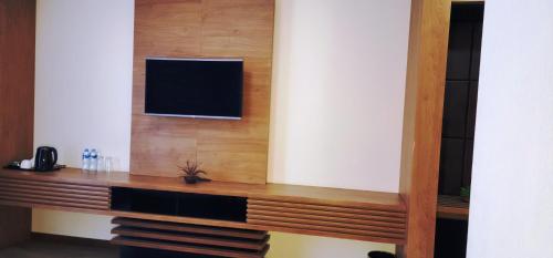 a television on a wall in a room at Hotel Panorama Gareji in Sagarejo