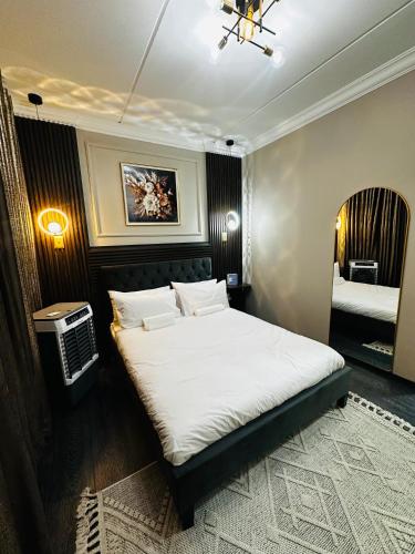 a bedroom with a large bed in a room at suarez homes in Chartwell