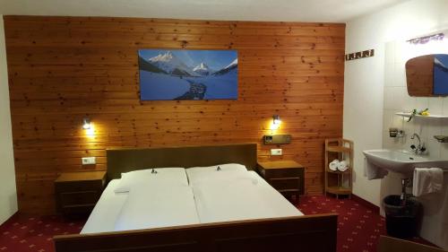Posteľ alebo postele v izbe v ubytovaní Hotel Valisera