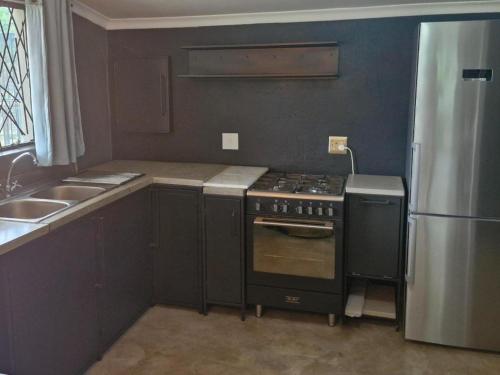 Una cocina o zona de cocina en The House On The Hill