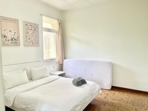 Ένα ή περισσότερα κρεβάτια σε δωμάτιο στο My Cozy Nest - Near Beach