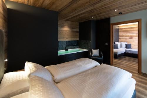 Letto o letti in una camera di Sport Hotel S. Vigilio