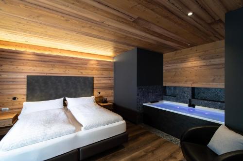 Letto o letti in una camera di Sport Hotel S. Vigilio