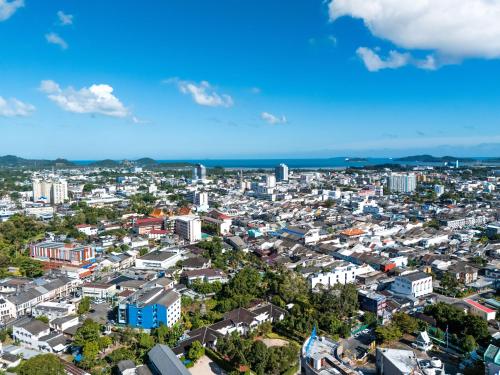 an aerial view of a city with buildings at Nyonya Maison Boutique Hotel Phuket Old Town in Phuket Town