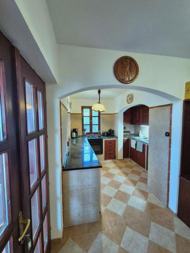 Η κουζίνα ή μικρή κουζίνα στο Dorono House