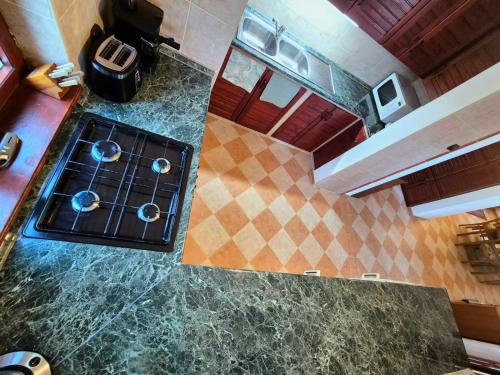 Η κουζίνα ή μικρή κουζίνα στο Dorono House