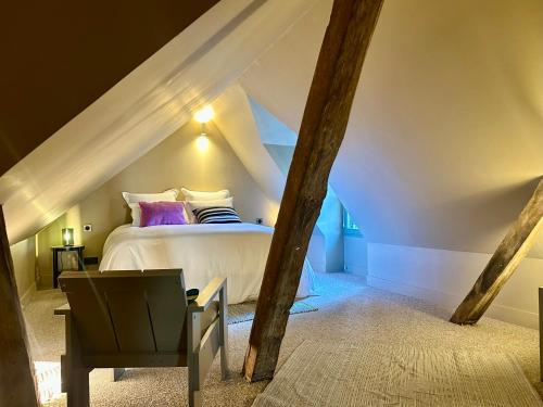 Ένα ή περισσότερα κρεβάτια σε δωμάτιο στο Auberge Radieuse