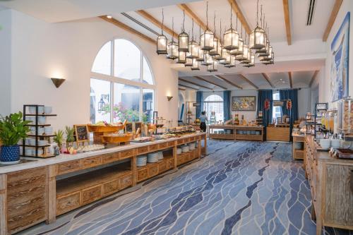 a large room with aasteryasteryasteryasteryasteryasteryasteryasteryasteryasteryastery at Risemount Premier Resort Da Nang in Da Nang