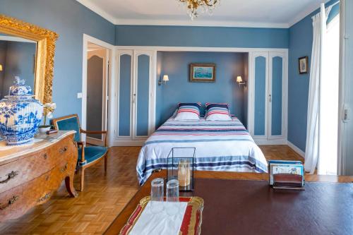 Postel nebo postele na pokoji v ubytování L'annexe - Chambre