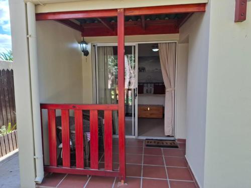 Un balcón o terraza de Cedar Lodge Guest House