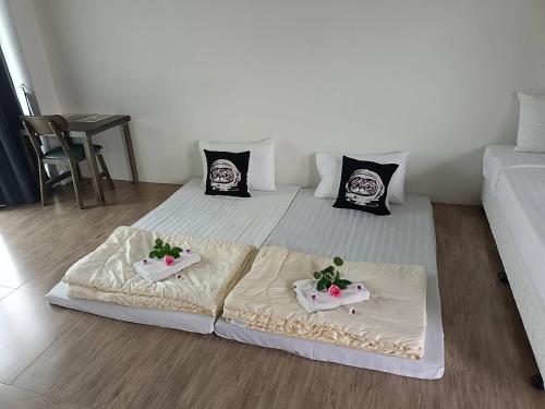 Postel nebo postele na pokoji v ubytování Comfy Hotels Suvarnabhumi Airport