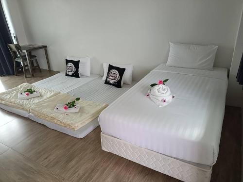 Postel nebo postele na pokoji v ubytování Comfy Hotels Suvarnabhumi Airport