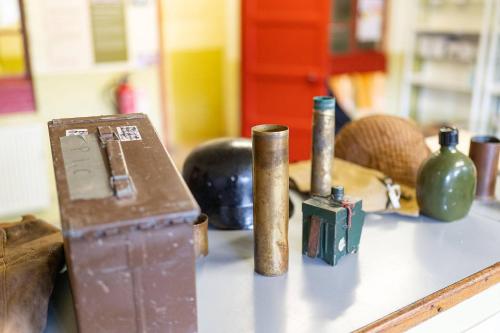 a group of items sitting on top of a table at Cultybraggan Hut 36 in Mill of Fortune