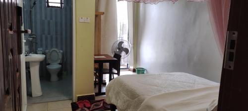 Katil atau katil-katil dalam bilik di NORTHERN HEIGHTS HOTEL Gulu