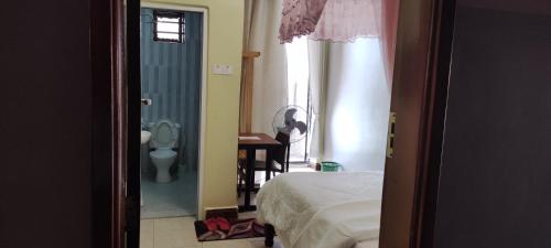 Katil atau katil-katil dalam bilik di NORTHERN HEIGHTS HOTEL Gulu