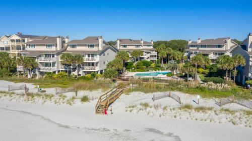 an aerial view of a beach with condos at Seagrove Villa 5B - Oceanside Villa in the Trees in Isle of Palms