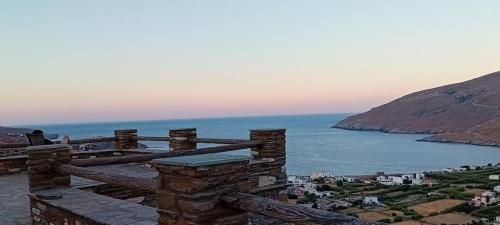 a view of the ocean and a city and a town at Liopi Village Andros in Órmos