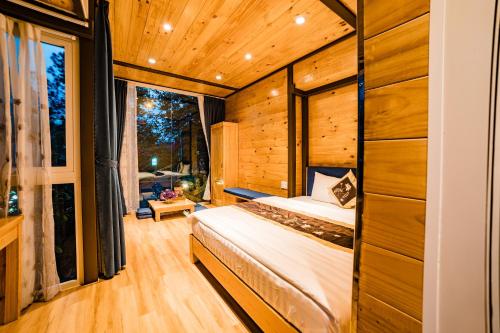 Postel nebo postele na pokoji v ubytování Dragon Villa