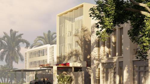 a rendering of a building with palm trees at M Suites And Hotel in Cochin