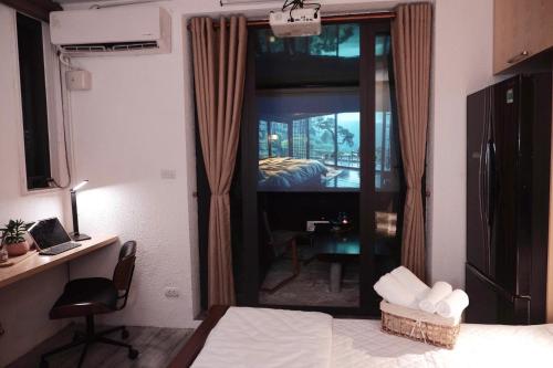 Postel nebo postele na pokoji v ubytování Dfour Home Trần Quốc Toản, Hoan Kiem, Ha Noi Old Quarter
