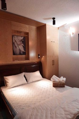 Postel nebo postele na pokoji v ubytování Dfour Home Trần Quốc Toản, Hoan Kiem, Ha Noi Old Quarter