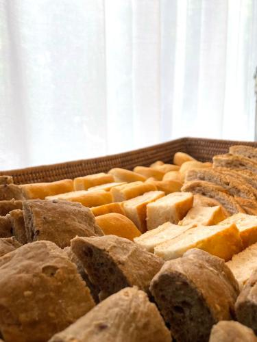 a bunch of breads sitting on a table at Hotel Eden in Cinquale