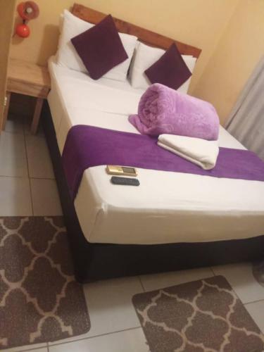 Postel nebo postele na pokoji v ubytování Salvie Geust Inn