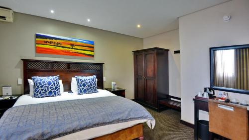 Katil atau katil-katil dalam bilik di ANEW Hotel Witbank Emalahleni