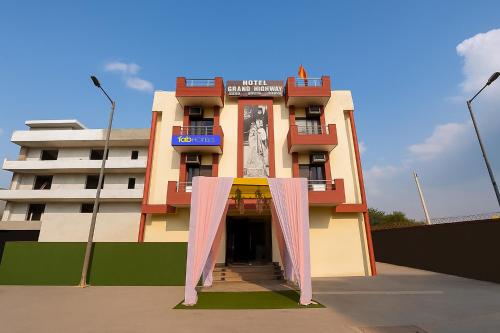a building with a banner in front of it at FabExpress Grand Highway in Faridabad
