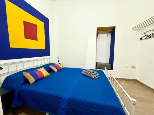 Postel nebo postele na pokoji v ubytování Vicolo Giardi