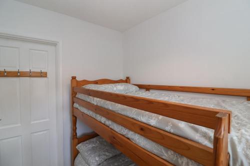 Ένα ή περισσότερα κρεβάτια σε δωμάτιο στο Flat 8