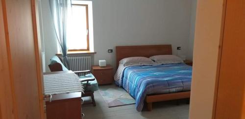Ένα ή περισσότερα κρεβάτια σε δωμάτιο στο Casa Sonia
