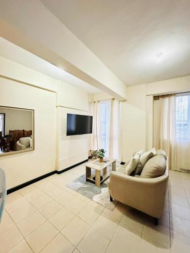 TV a/nebo společenská místnost v ubytování Magallanes Residences Condominium 211&212B