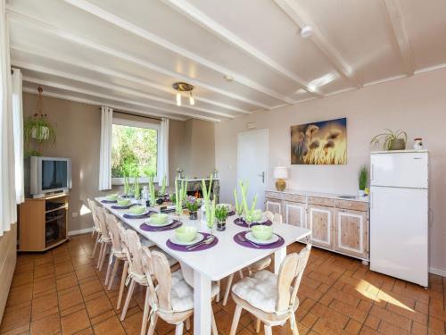 a large dining room with a white table and chairs at Hilltop Haven in Malmedy in Malmedy